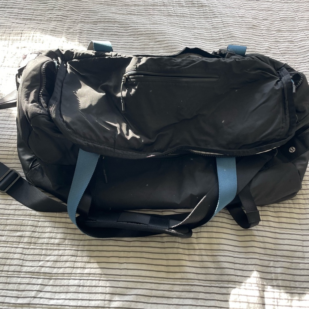 Lululemon black duffle bag - tons of storage and pockets!